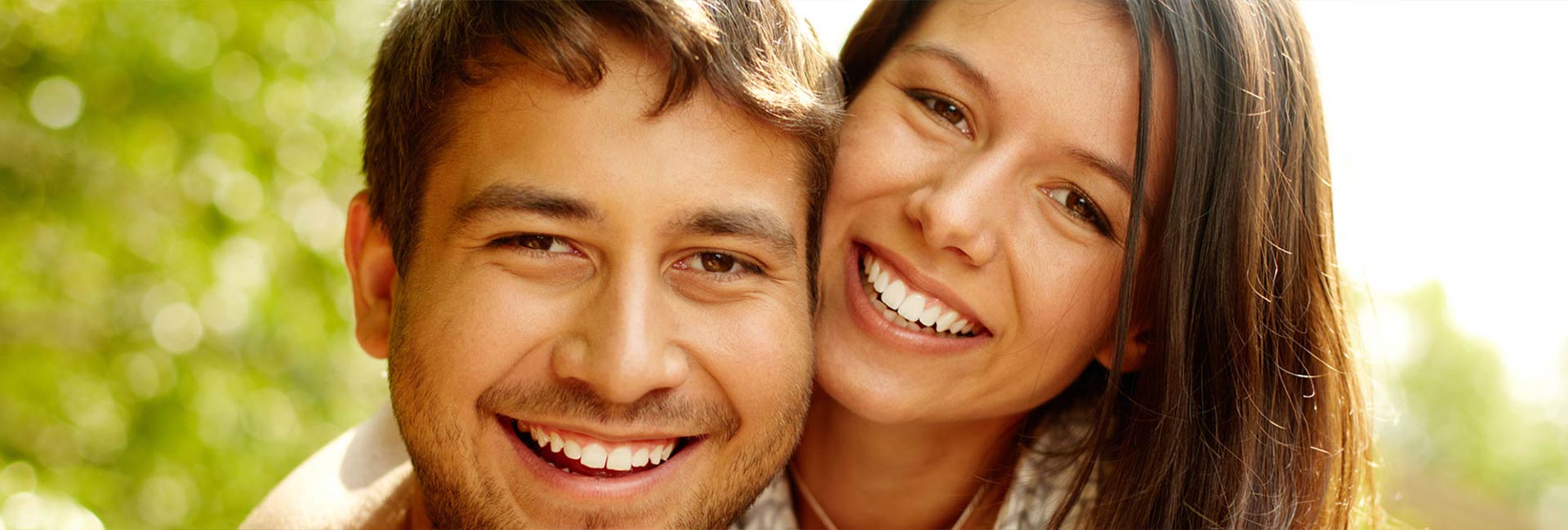 A happy hispanic couple smiling