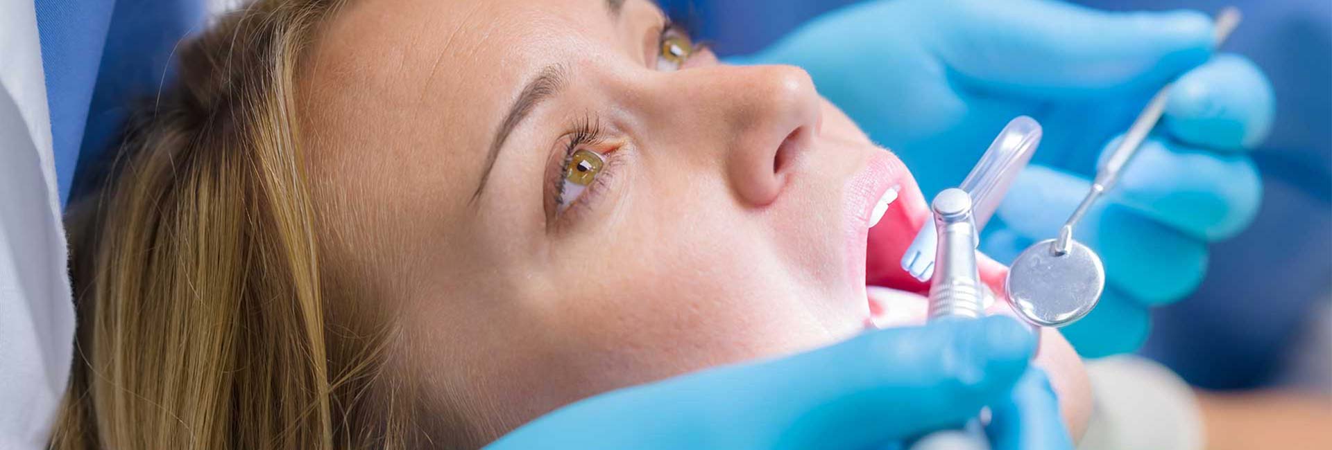 Woman getting a dental examination